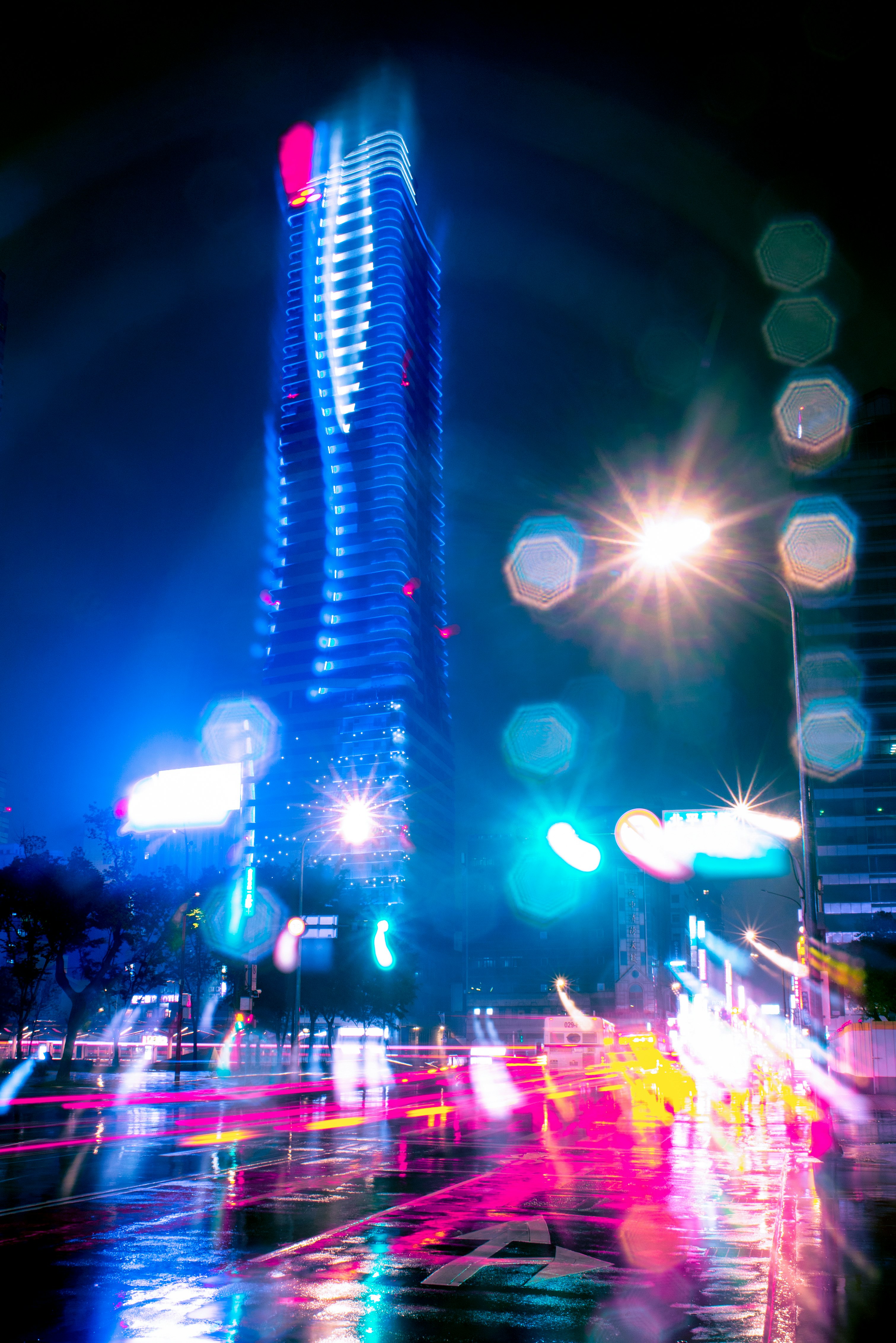 people walking on street during night time